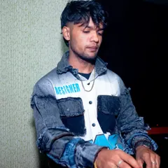 Focused on the mix, deep in the music. A shot of me at the decks during a weekend party, making sure every transition is perfect to keep the energy rolling.
