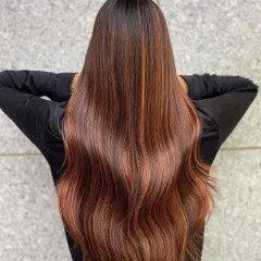 The beauty of copper tones on Indian skin is unmatched. This look features a rich copper balayage with fiery highlights that add warmth and radiance. I use Wella Professionals colors to create these vibrant, healthy-looking results that truly shine.