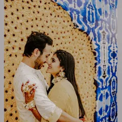 A close-up of Sonali and Hemant sharing a loving glance during their Haldi. This shot highlights the intimate connection between the couple, even in the midst of a lively celebration.