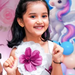 The birthday star's radiant smile says it all. Our goal is to capture that genuine happiness in beautiful, relaxed portraits you will cherish forever.