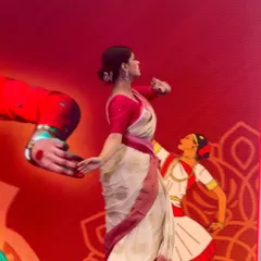 A still from my interactive performance at the Vivekananda Education Society's College. The backdrop, filled with artistic representations of dance, created a perfect setting to share a piece of my learning with the students.