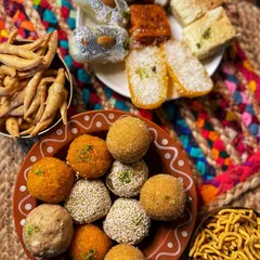 A beautiful spread of our offerings. From laddoos and barfis to namakpare and sev, we have a wide variety of lip-smacking Indian sweets and snacks.