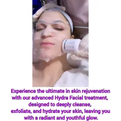 A client experiencing the deep cleansing and hydrating vortex of our popular HydraFacial. This treatment removes impurities while infusing the skin with nourishing serums for an instant, radiant glow.