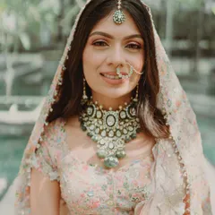 A close up of Tanisha's soft and dewy phera makeup. I focused on creating luminous skin and a gentle glow that looked fresh and natural for her daytime ceremony, perfectly complementing her pastel Anamika Khanna ensemble.