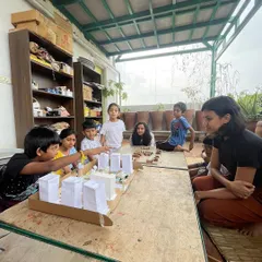 Children presenting their model for a redesigned, sustainable Jayanagar Shopping Complex. This month-long project involved research, community interviews, and creative problem-solving.