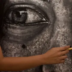 The eyes are where the soul of a portrait lives. Here, I am carefully adding layers and reflections to bring life and emotion to the eye of 'The Tourist Guide.'