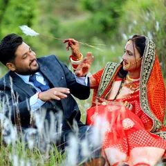 A playful and spontaneous moment between a couple during their outdoor shoot. We encourage couples to be themselves, which results in the most natural photos.