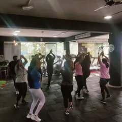 A silhouette shot of our dance class. The focus is on moving your body and feeling the music.