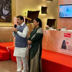 I ensure the message is delivered clearly with professional audio-visual support for speakers on the main stage. Here, a speaker addresses the audience at the Temples Convention.
