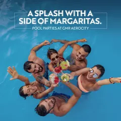 A fun-filled pool party scene with friends toasting with margaritas. This image captures the aspirational and recreational lifestyle we offer, perfect for a sunny day.