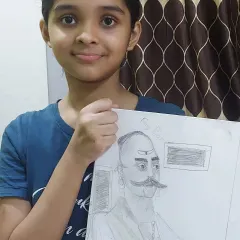 Pranvi, a 4th-grade student, proudly shows her pencil sketch portrait. Learning to draw portraits is an important skill that builds observation and fine motor control.