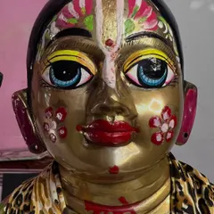 A 'before' photo of a Kanha idol, showing the original paintwork before I began my custom restoration and repainting.
