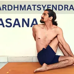 Ardha Matsyendrasana (Half Lord of the Fishes Pose) is a seated twist named after the founder of Hatha yoga. It increases spinal flexibility and stimulates digestive organs.