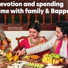 A candid moment of the couple during the puja. The styling was designed to be comfortable yet festive, allowing for natural interaction while looking picture-perfect.