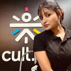 Posing with the Cult.fit logo. I am proud to be a trainer with a brand that is revolutionizing fitness in India.