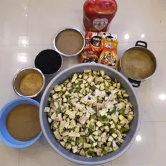 These are the building blocks of my Aam ka Achaar. I use fresh, chopped raw mangoes and a carefully measured blend of spices like turmeric, fennel, and mustard seeds. Quality ingredients are the key to great flavour.
