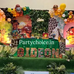 Our jungle and safari themed birthday parties are a huge hit with kids. We design a complete experience with character cutouts like Simba and Dumbo, themed cake stands, personalized photo displays, and dense balloon arches in jungle colors.