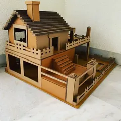 Another angle of the villa dollhouse, highlighting the open-concept lower level and the cozy upstairs room. Every part is pre-cut for a smooth, satisfying building experience.