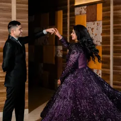 Not just a portrait, but a reflection of grace and love. This shot captures the elegance of the couple and the beautiful movement of the bride's gown, creating a fairytale moment.
