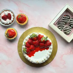 Strawberry season is my favourite! Here's a spread of some of my strawberry desserts, including a fresh cream cake, mini cheesecakes, tarts, and chocolate-dipped strawberries.