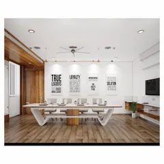 The conference room at SVG Exports was designed to be a clean, sophisticated, and inspiring space for collaboration. A custom V-shaped conference table anchors the room, complemented by minimalist decor, motivational wall art, and warm wood flooring, reflecting a modern and forward-thinking corporate culture.