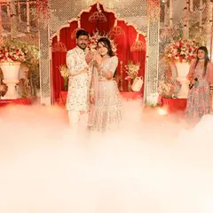 A magical engagement moment as the couple exchanges rings, enveloped in a cloud of low fog and surrounded by sparklers. We capture the drama and romance of your big moments.