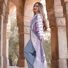 A slightly different angle that plays with the depth of field, keeping the model sharp while the background arches recede softly.