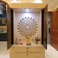 Another view of the compact pooja unit, showing its elegant design with rounded edges and a high-gloss finish.