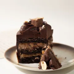 A close-up of that irresistible slice. Every component of my Snickers cake is made to deliver that "yummy yummy yummy" feeling.
