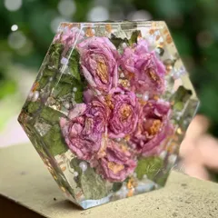 Another view of the hexagon flower block, showing the depth and clarity of the resin that encases the preserved pink roses.