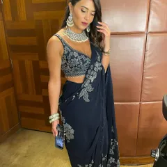 Here is a complete party look I created, including makeup, hair, and styling assistance. The makeup features a subtle smokey eye and glowing skin, paired with soft waves to complement the modern saree.
