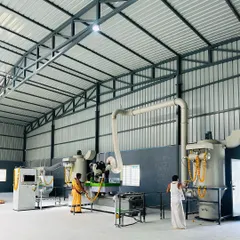 Another view of the machinery at our Vivista India factory, decorated with garlands for the inaugural pooja.