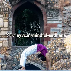 A student performs Chakrasana (Wheel Pose), a deep backbend that opens the heart center. This posture reflects the physical and energetic opening that our advanced online courses aim to facilitate for dedicated practitioners.