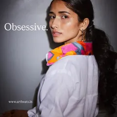 An obsessive level of detail goes into each collar. This one, on a classic white shirt, features a vibrant, geometric art piece that is truly a conversation starter.