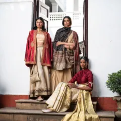 A group shot showcasing a variety of trousseau-worthy outfits. From a lehenga with a jacket to layered sarees, this demonstrates how I build a versatile and coordinated wardrobe.
