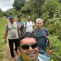 A selfie with a group of happy trekkers on the Thadiyandamol trek in Coorg. It's the highest peak in the district and offers stunning views.