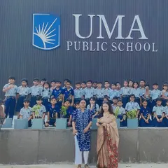 A wide shot showing the modern architecture of Uma Public School, which serves as the backdrop for our equestrian activities.