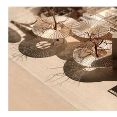 The model shows the beautiful 'moiré' effect of shadows cast by the perforated canopies, a key part of the design experience we wanted to create.