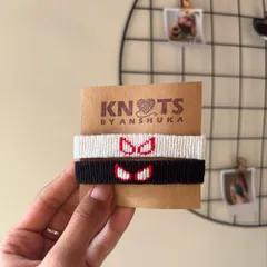 For all the Marvel fans, I made these custom Spider-Man friendship bracelets. Each one is hand-knotted with detailed Spidey eyes, available in both the classic black and white suit designs. They are perfect for you and your superhero-loving bestie.