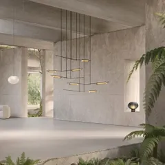 For me, lighting is kinetic art. The Volant chandelier is a perfect example, a static sculpture that appears to be in perpetual motion. Its angled glass elements and solid brass bars create an elegant equilibrium, making it a captivating focal point in modern, architectural interiors.