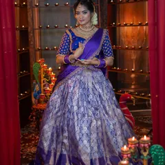 Another beautiful pose from the same festive shoot, highlighting the traditional attire and jewellery.