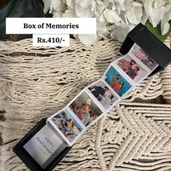 A clear shot of the 'Box of Memories' pull-out photo strip. This affordable gift, priced at ₹410, is perfect for anniversaries, birthdays, or just because.