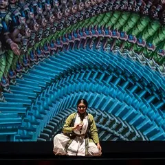 A meditative moment from 'Antariksha Sanchar', where the dancer is framed by a psychedelic, fractal representation of temple architecture. This is an example of how I use multimedia to explore spiritual concepts in a contemporary visual language.