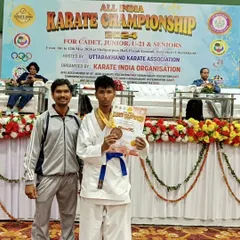 Here is my student Neeraj B on the podium after his victory at the All India Karate Championship 2024. His achievement is a testament to his perseverance and rigorous training.