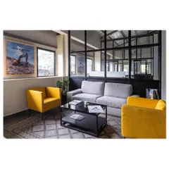 Our commercial interiors balance function with a strong corporate identity. In this Nagpur office, we used a minimalist Scandinavian design language with pops of color and glass partitions to create a welcoming yet professional waiting area that feels open and connected.