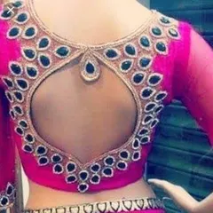 A keyhole back design outlined with heavy stonework is a great way to make a statement. I can create this style in any color with custom embroidery to match your saree.
