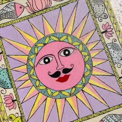 A close-up of my pastel Madhubani painting of Surya Dev, created in gratitude to the sun for Chhath Puja. The design features traditional fish and lotus motifs.