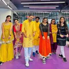 A candid moment from our Day 1 Navratri dandiya session. Everyone is focused on getting the steps right while still having a great time together.