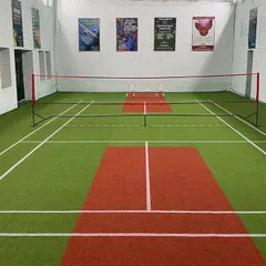 A clear look at our awesome court. This is the first-ever multi-sport turf badminton court in Sion, ready for your best game, day or night.