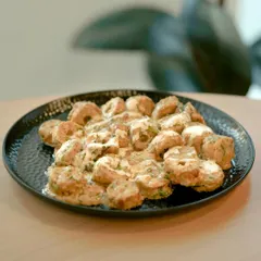 A platter of my creamy chicken and herb rolls, sliced and ready to serve. This is an elegant appetizer that is perfect for sophisticated events.